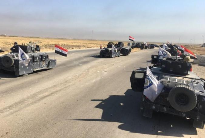 Members of Iraqi federal forces enter oil fields in Kirkuk, Iraq